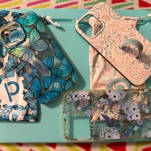 iPhone 13 Pro Max cases. 2 gently used Loopy Cases and 1 beautiful case.
